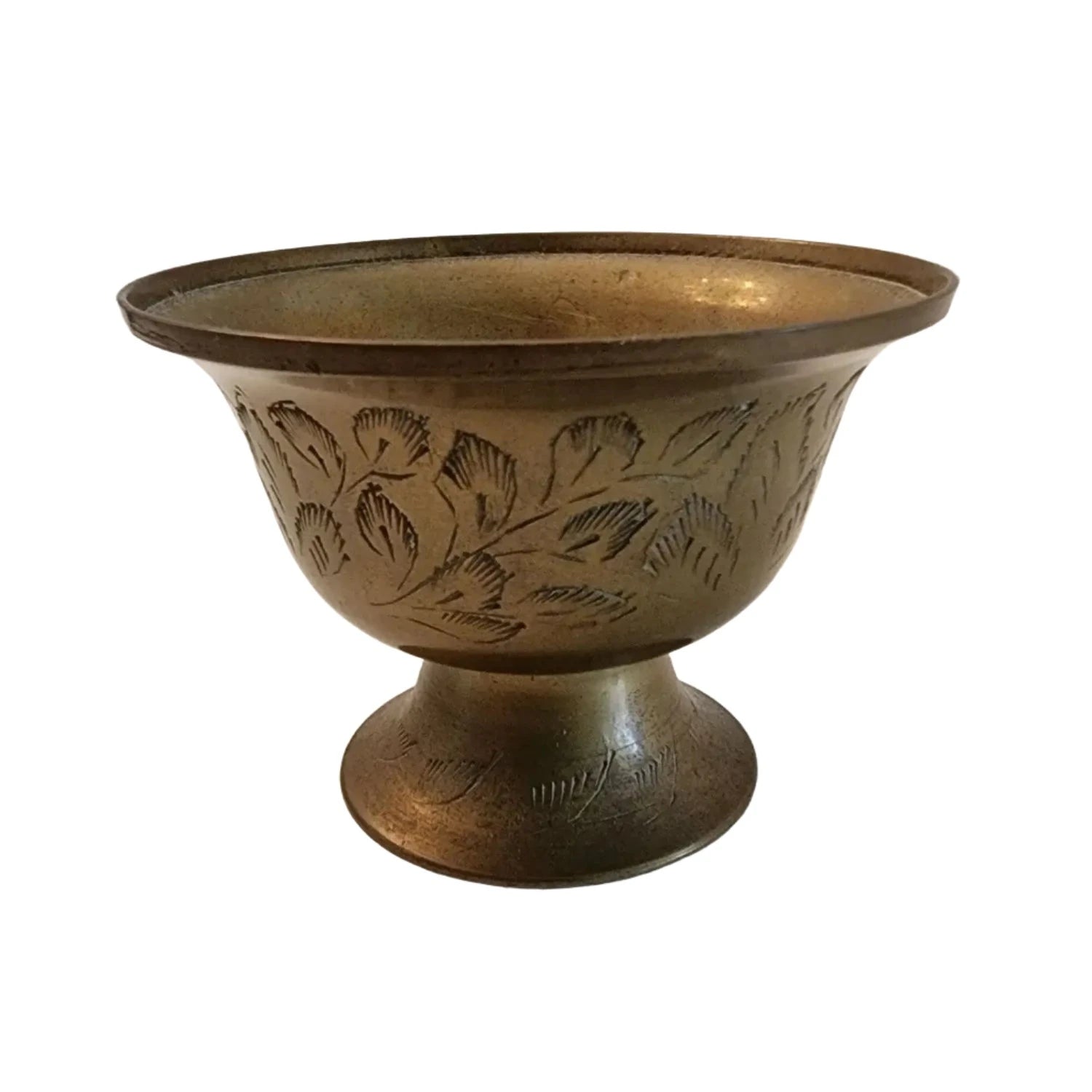 A beautifully crafted brass bowl adorned with intricate designs, showcasing elegance and artistry in every detail.