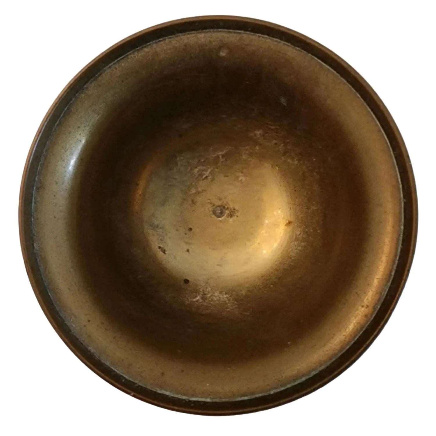 A beautifully crafted brass bowl adorned with intricate designs, showcasing elegance and artistry in every detail.