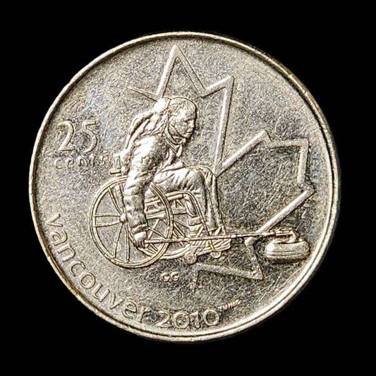 A coin featuring a man in a wheelchair seated on it, symbolizing inclusivity and representation.