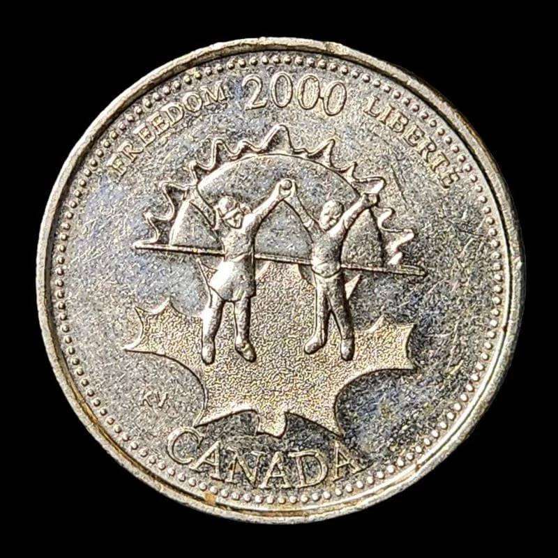 2000 Canadian coin, featuring a unique design, showcased on a black background.