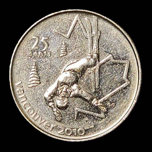 A coin featuring a skier, capturing the essence of winter sports and adventure in a compact design.