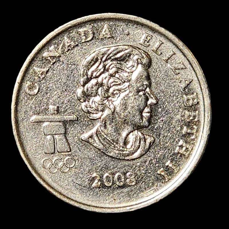 A coin featuring a skier, capturing the essence of winter sports and adventure in a compact design.