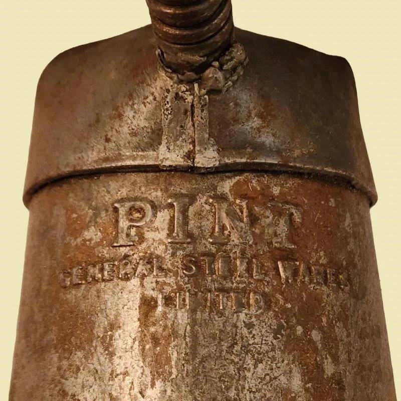 An antique jug with a lengthy nose, perfect for tending to automotive needs