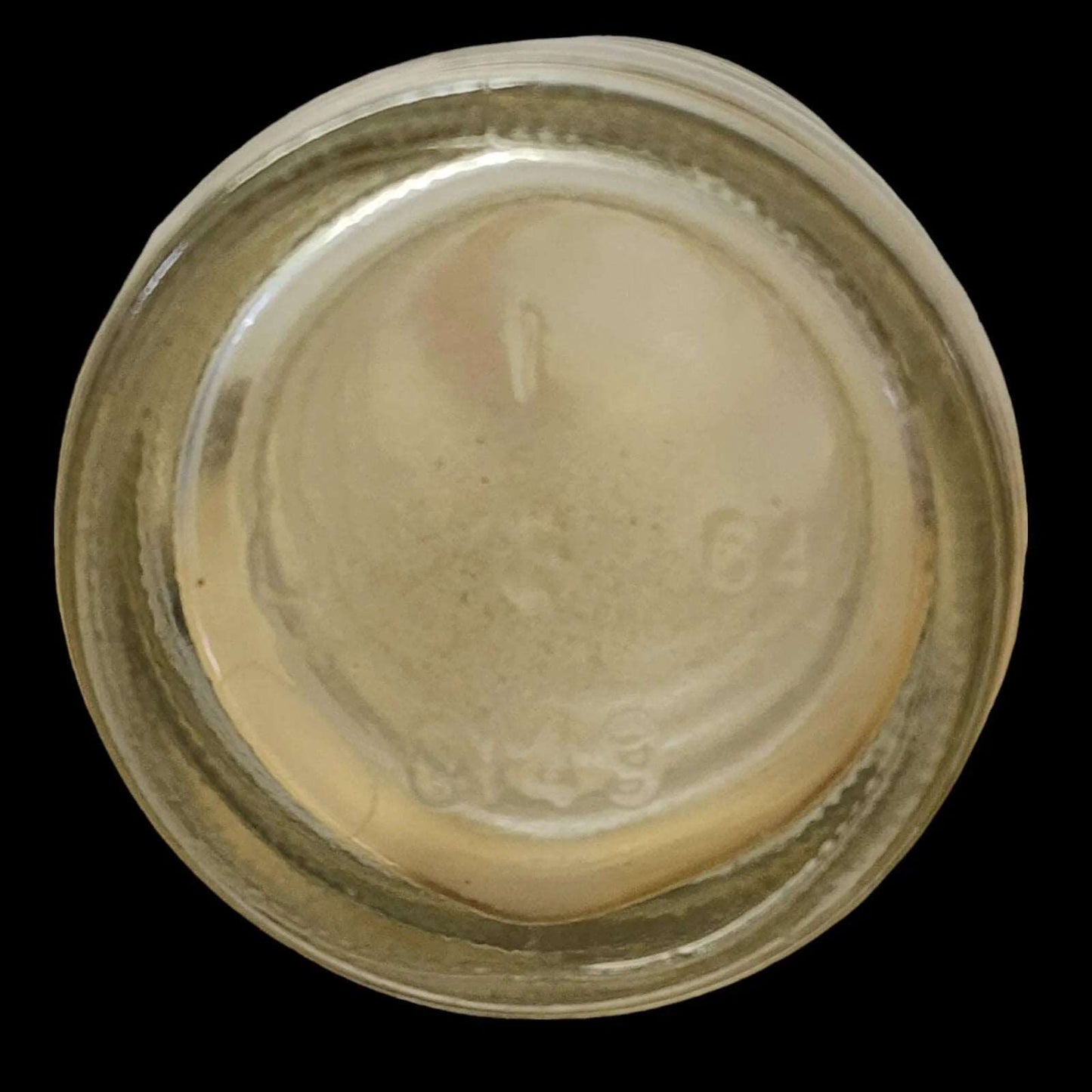 Dark backdrop featuring Howdy soda bottle.