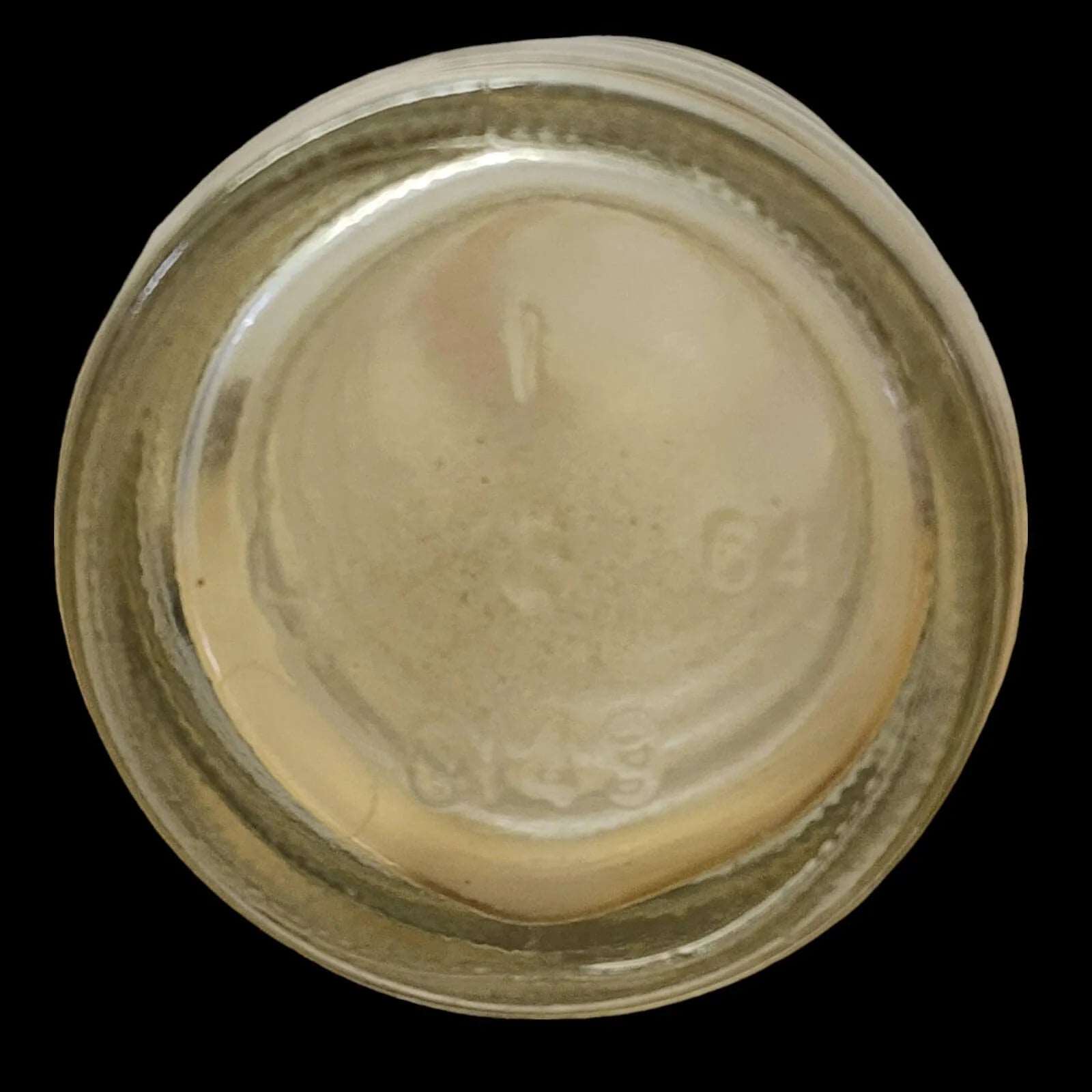 Dark backdrop featuring Howdy soda bottle.