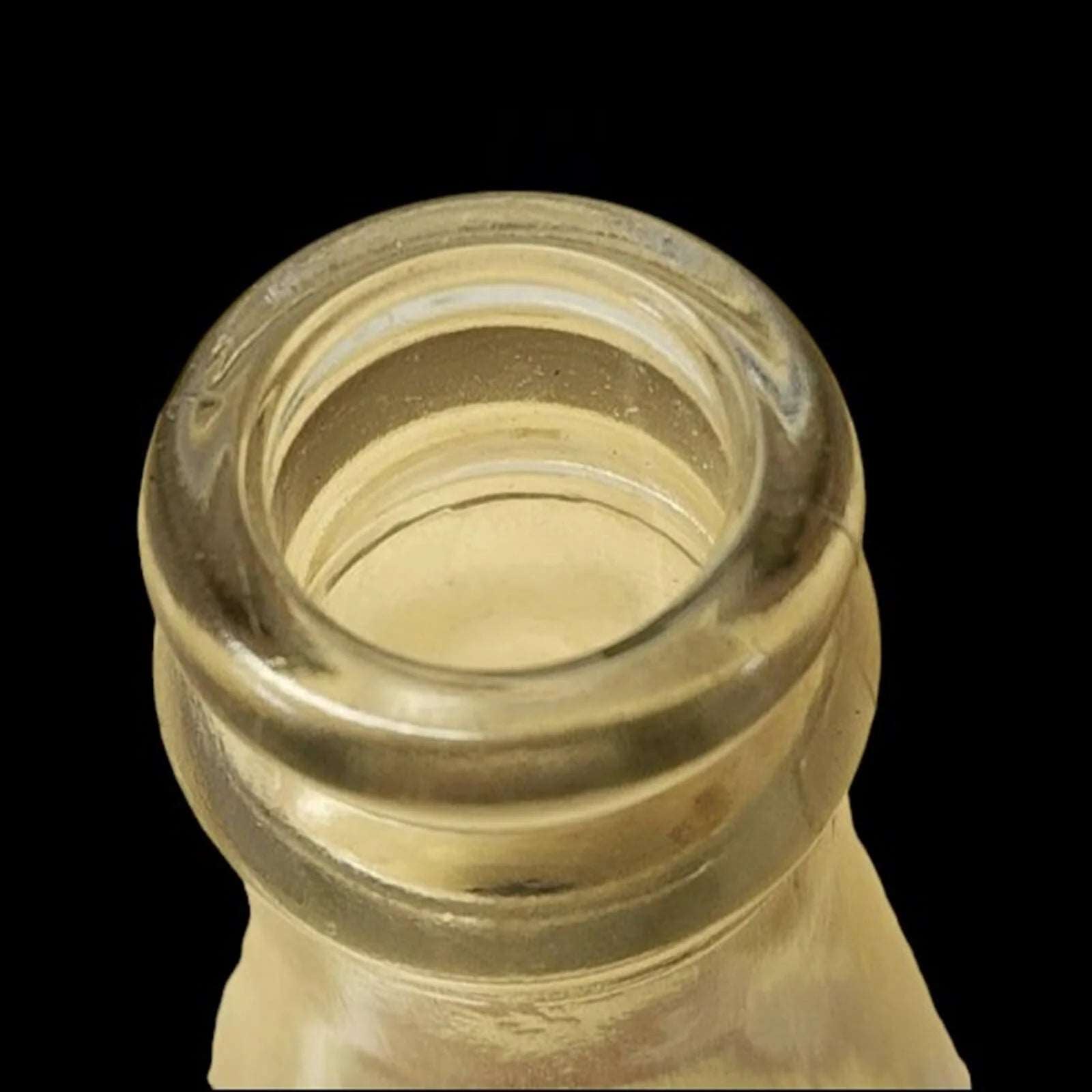 Dark backdrop featuring Howdy soda bottle.