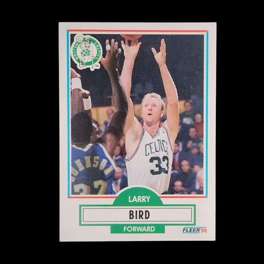 Sports trading card of Larry Bird in action.