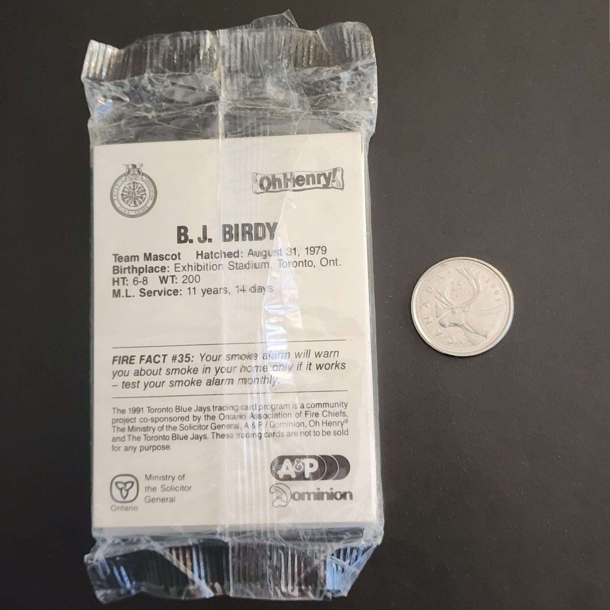 All Star Game logo card set beside a small coin.