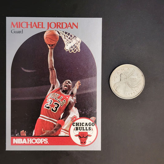 michael jordan leaping with basketball to the net