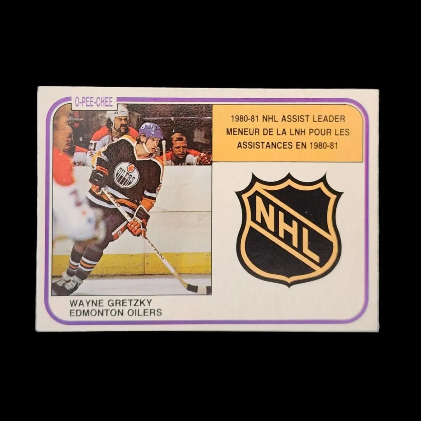 A hockey trading card featuring Wayne Gretzky and the NHL logo.