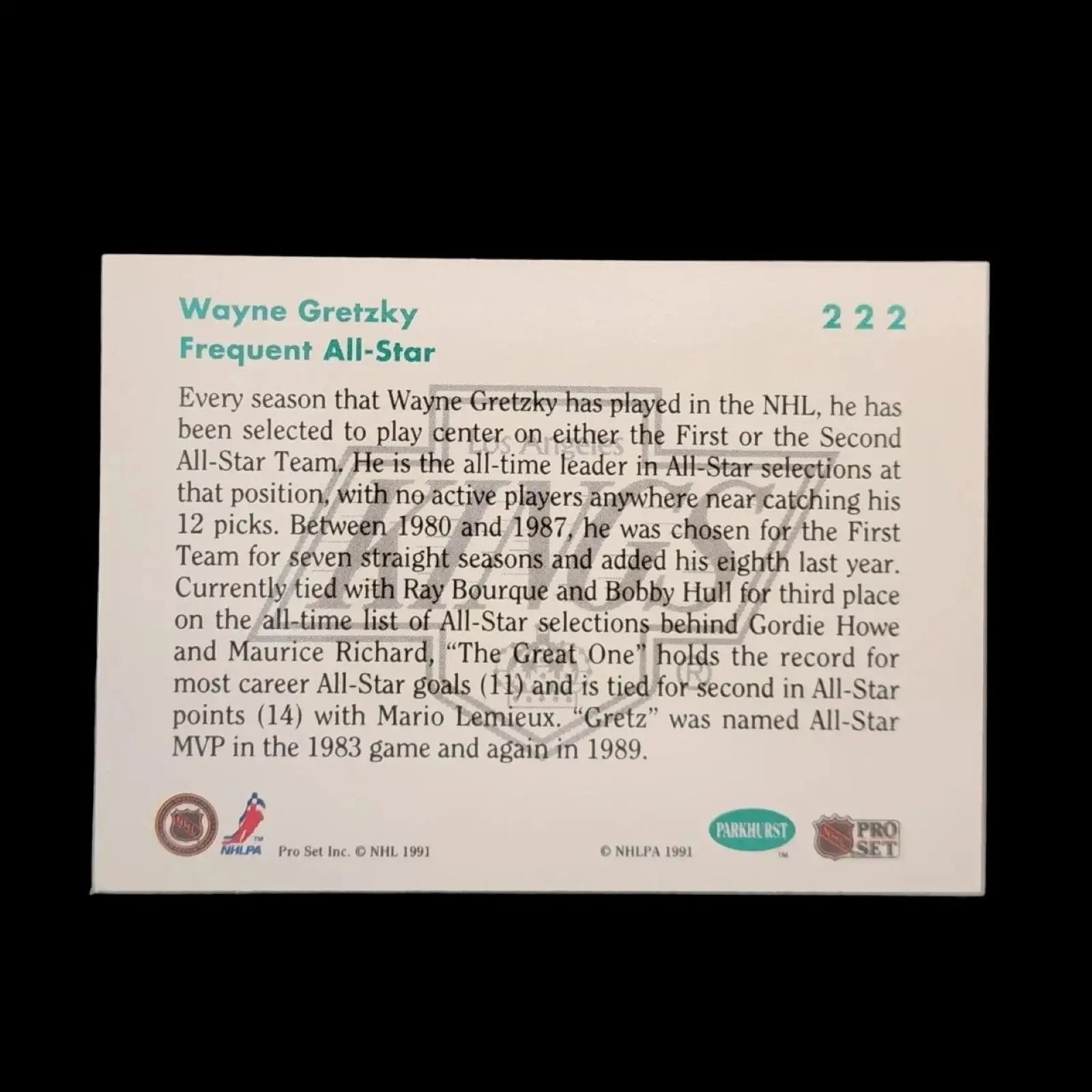 A hockey card featuring a coin placed beside it, showcasing the sport's memorabilia and potential value.