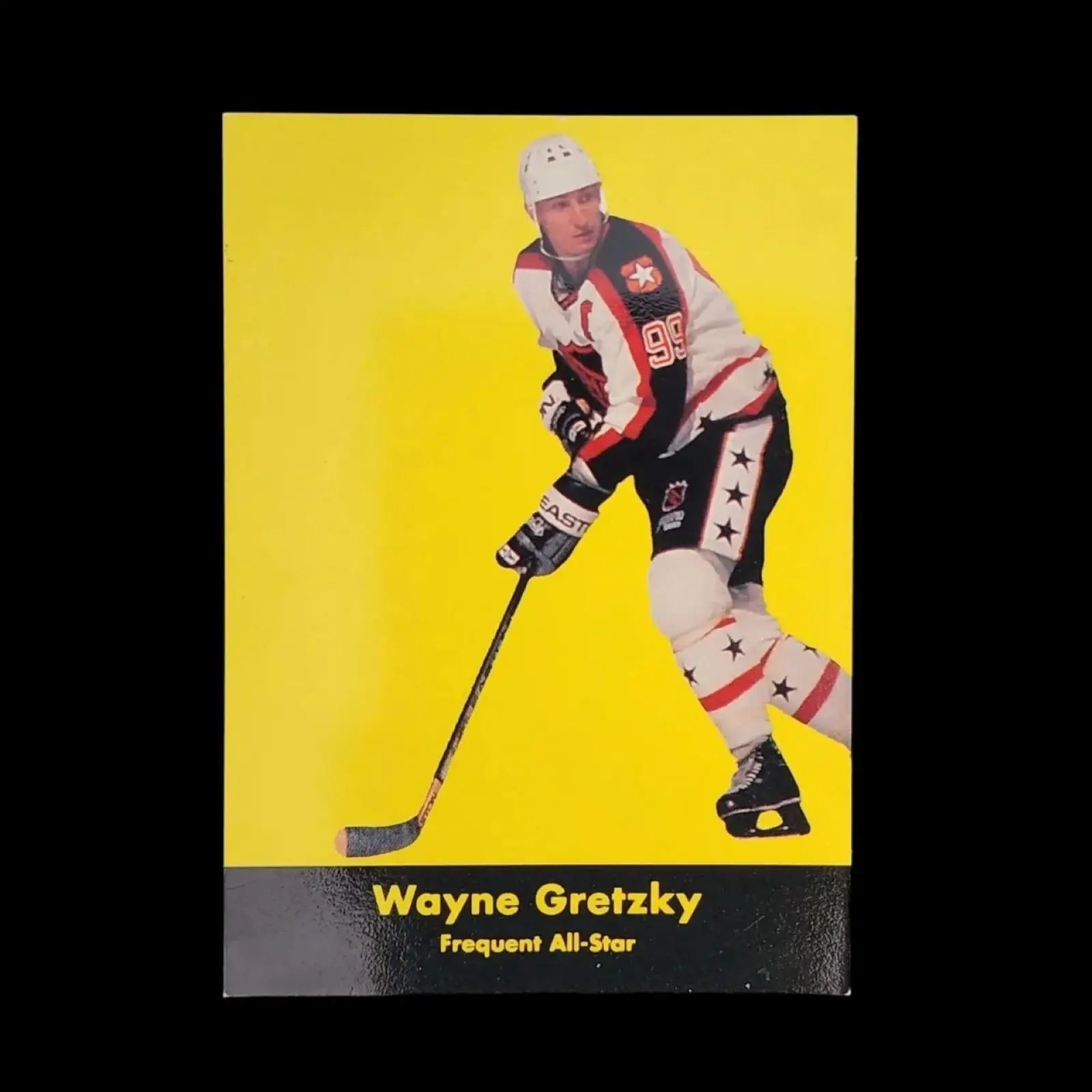 A hockey card featuring a coin placed beside it, showcasing the sport's memorabilia and potential value.