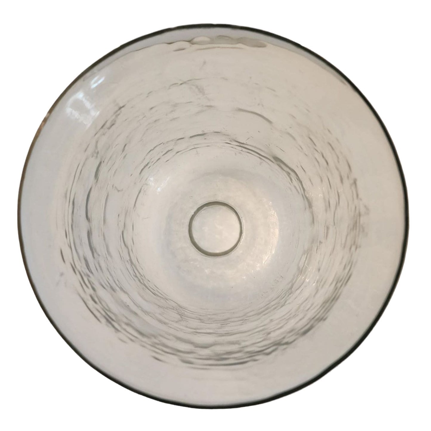 A white Santa Claus figurine adorned with a gold ribbon, symbolizing the festive spirit of the holiday season.