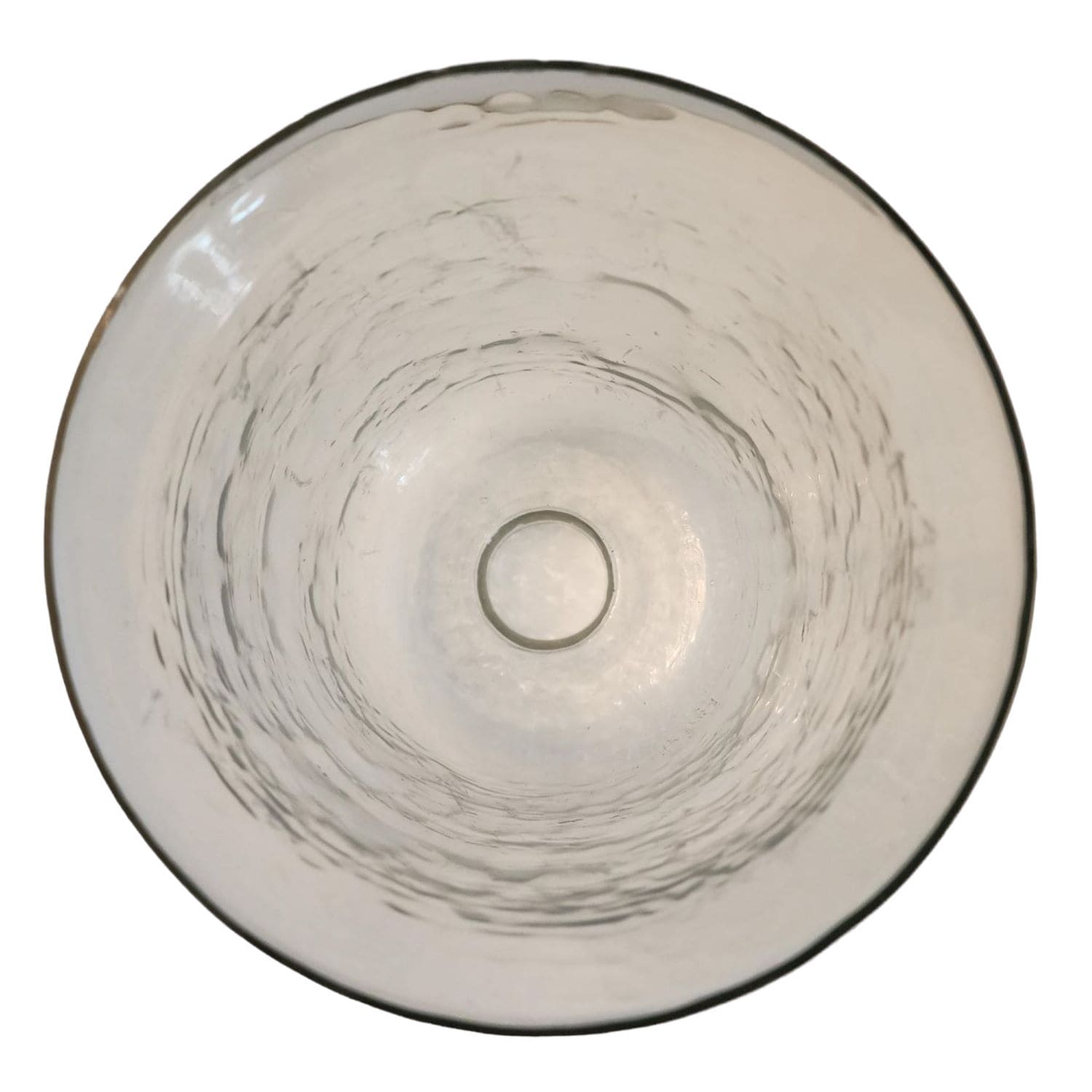 A white Santa Claus figurine adorned with a gold ribbon, symbolizing the festive spirit of the holiday season.