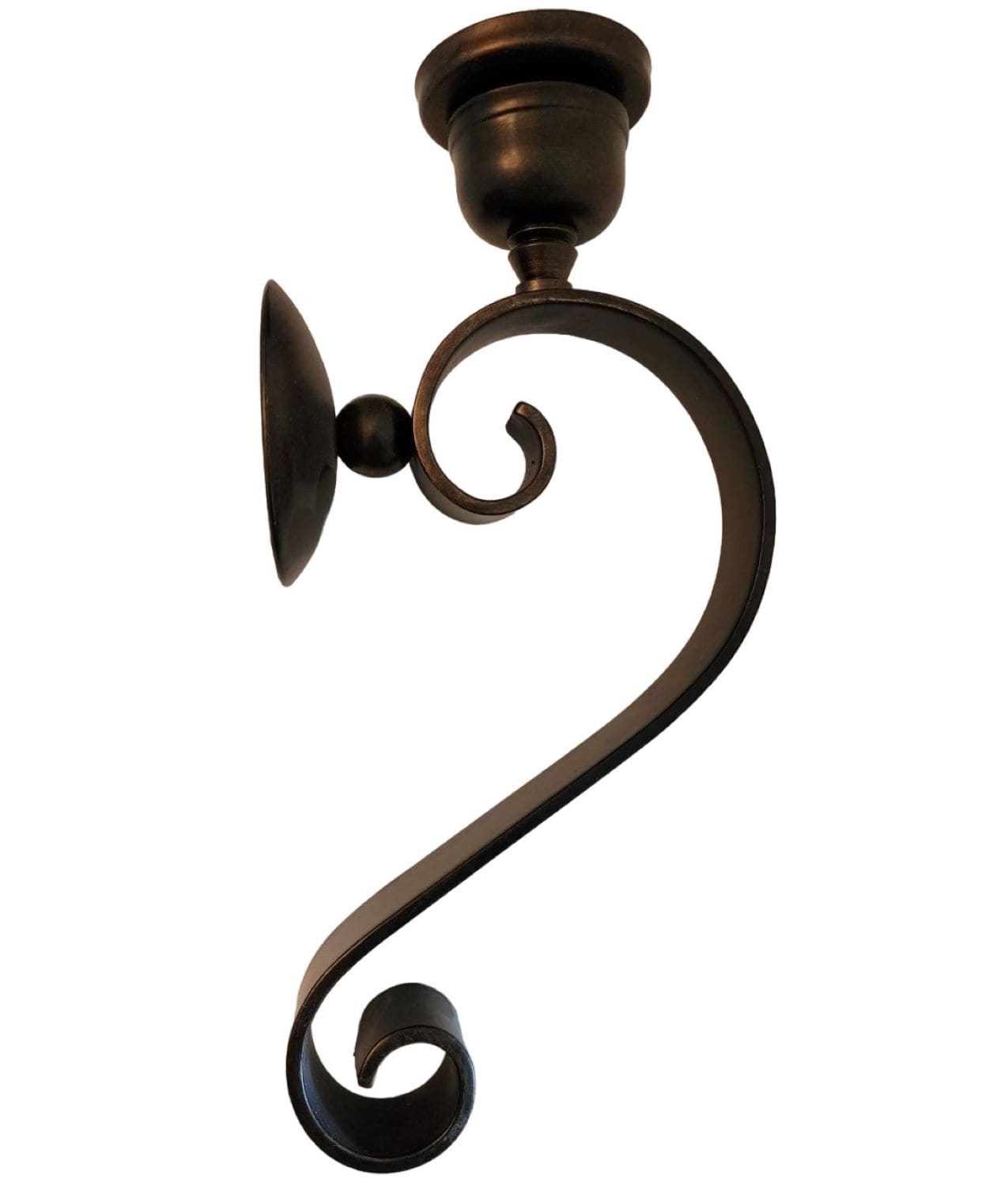 A white Santa Claus figurine adorned with a gold ribbon, symbolizing the festive spirit of the holiday season.