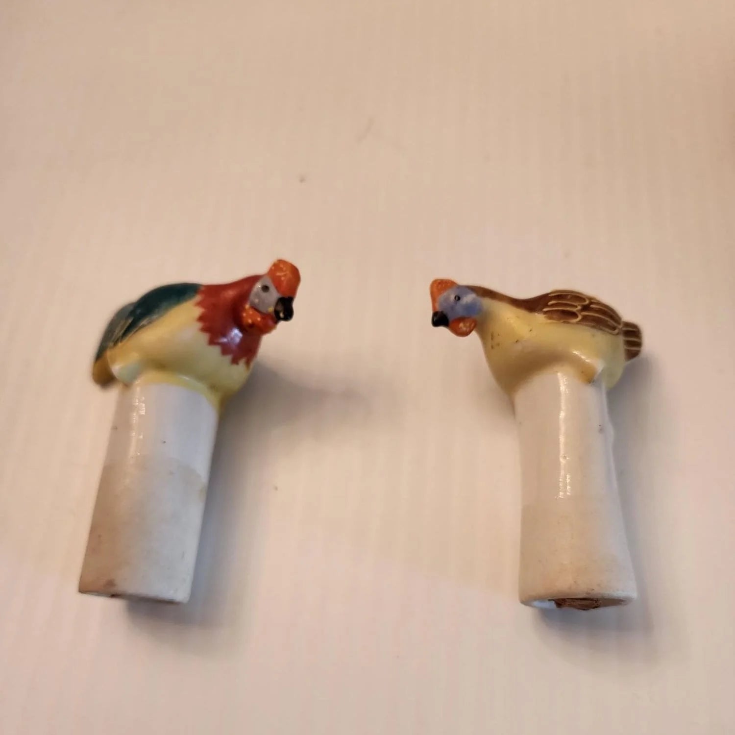 Delicate ceramic tray adorned with two bird designs.