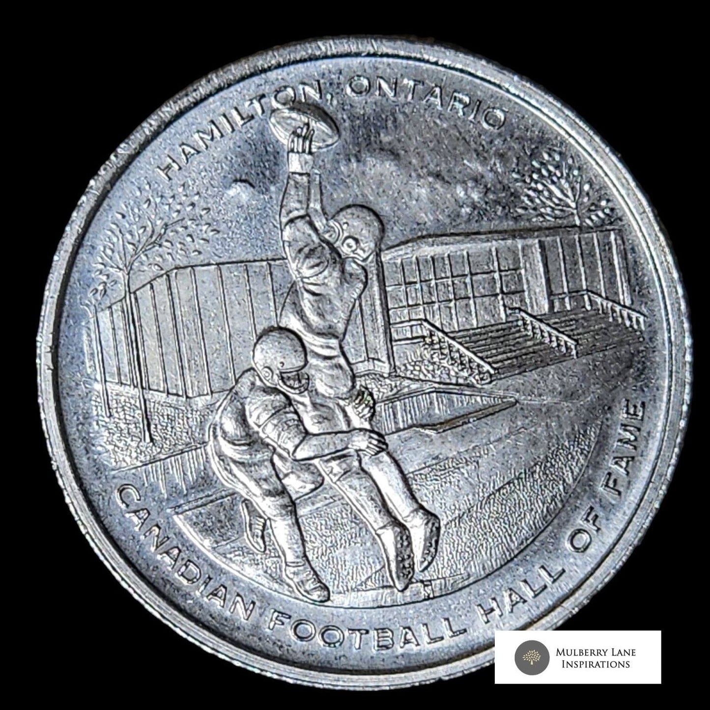 A coin with a grey cup symbol.