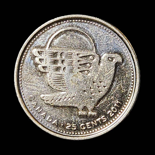 Canada 25 cents coin featuring an falcon.