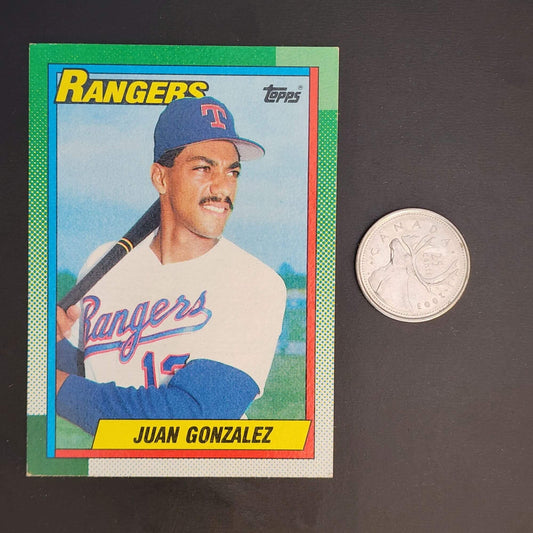 Baseball card featuring man with bat next to coin, vintage design, collectible sports memorabilia.