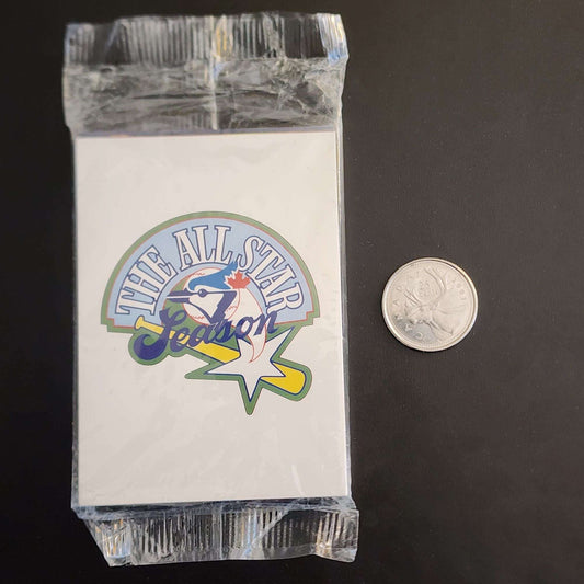 All Star Game logo card set beside a small coin.