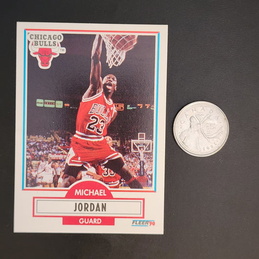 Basketball card featuring Michael Jordan, legendary NBA player, in action on the court.