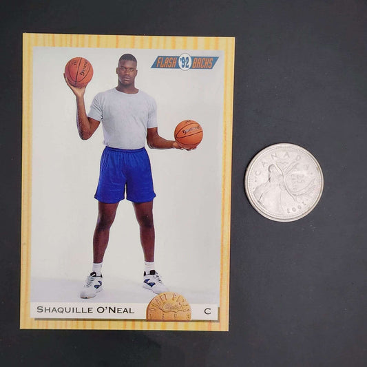 A basketball card featuring a man holding a ball, showcasing the essence of the sport.